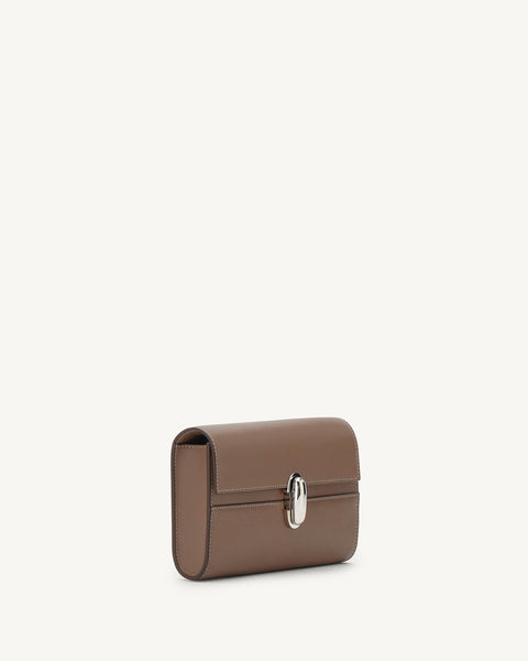 Brown leather clutch bag with a silver clasp on a white background