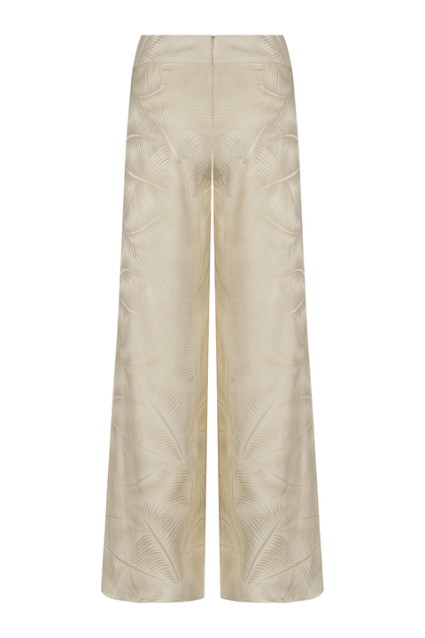 A pair of wide-leg trousers in a cream color, featuring a subtle tonal geometric pattern on the fabric and a zipper closure