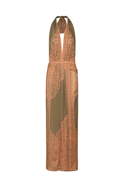 A halter-neck maxi dress with a deep V-neckline, featuring a solid olive green base with intricate peach and orange geometric and floral patterns, shown against a plain white background.