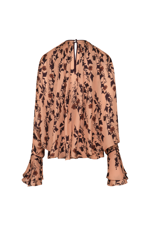 A long-sleeve blouse with a ruffled high neckline and flared cuffs, featuring an abstract brown and black print on a warm beige background, shown against a plain white background.