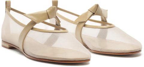 Pair of beige flats with transparent sole on a white background