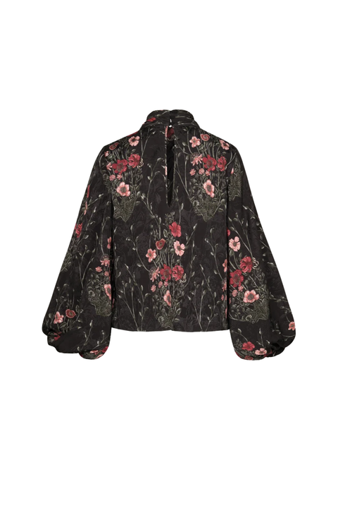 A black long-sleeve blouse with a red and pink floral print, featuring a high collar and voluminous balloon sleeves, shown against a plain white background.