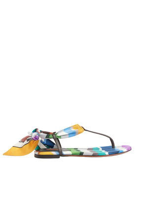 Multicolored sandal with a silk strap on a white background