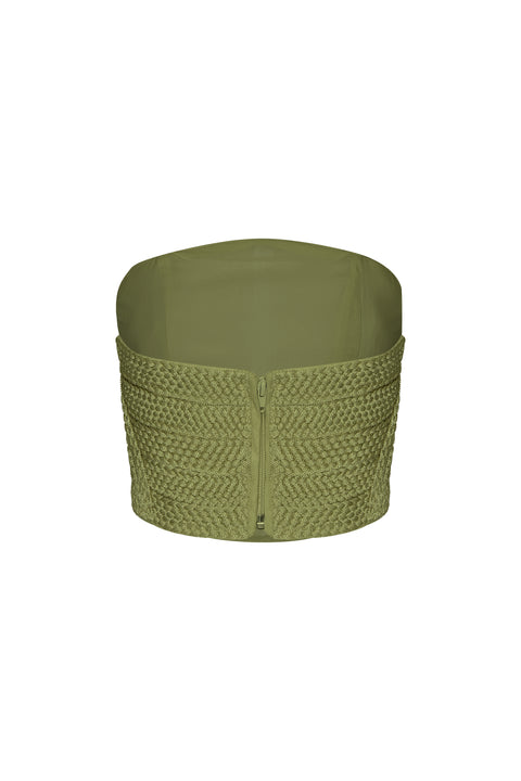 Flat lay of back of green woven strapless top on a white background