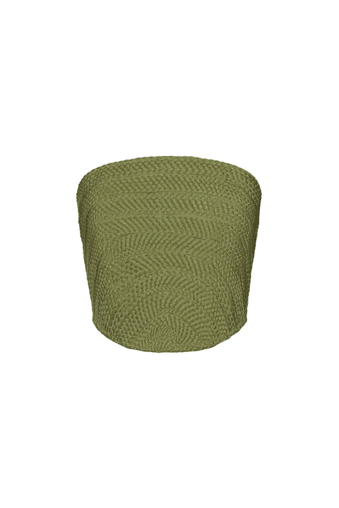 Flat lay of green woven strapless top on a white background