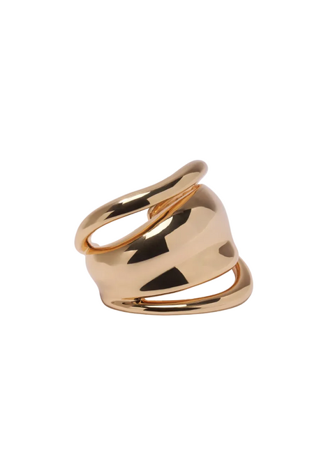 Gold arm cuff on a white background