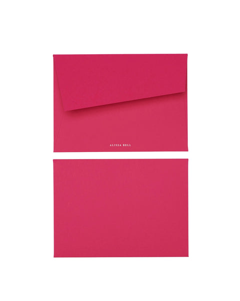 Pink stationary on a white background