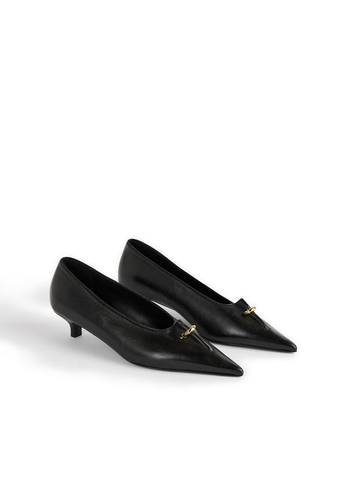 A pair of black pointed-toe kitten heels with a small gold metal accent on the vamp, displayed on a clean white background.