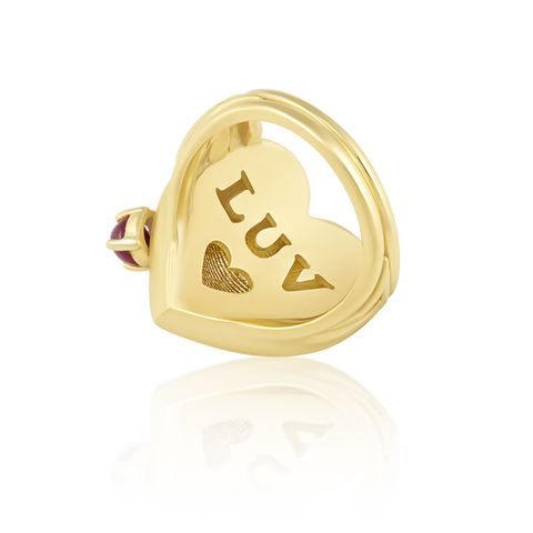 Gold heart-shaped ring with 'LUV' engraving on a white background