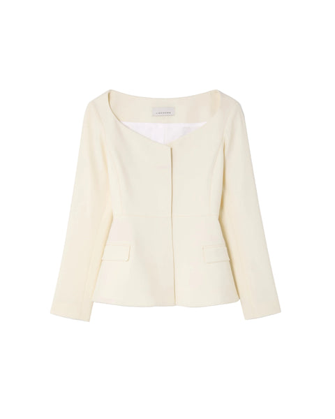 Light yellow blazer on a light gray background
