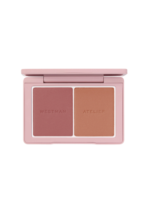 Westman Atelier two-pan makeup compact in a dusty pink case, featuring a rose pink blush and a warm tan bronzer, shown open against a plain white background.