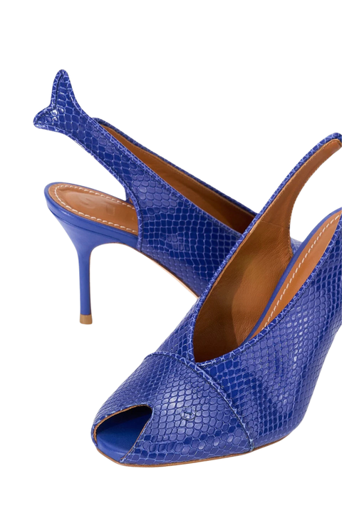 A cobalt blue heel shaped like a fish