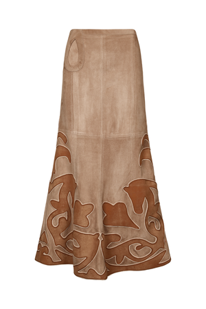 A long beige leather skirt with a brown abstract pattern concentrated along the lower half, shown against a plain white background.