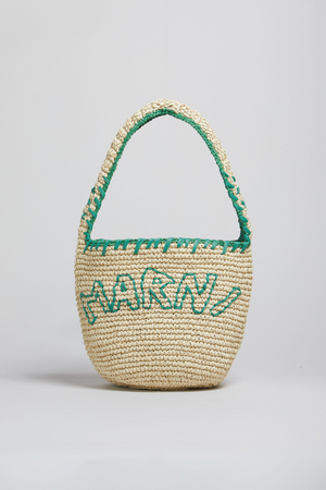 Woven basket with green handle and 'Marni' branding on a light gray background