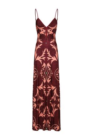 A floor-length spaghetti-strap dress in deep burgundy with a prominent coral-pink baroque floral pattern, shown against a plain white background.