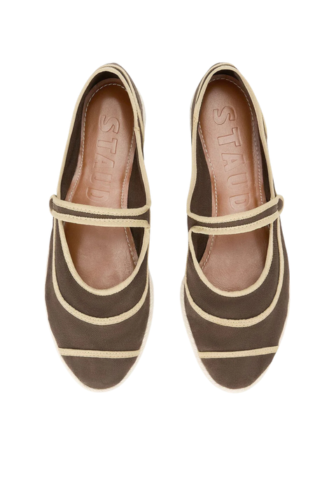 A pair of brown suede Mary Jane shoes with beige stripes and elastic straps, shown from a top-down view on a white background.