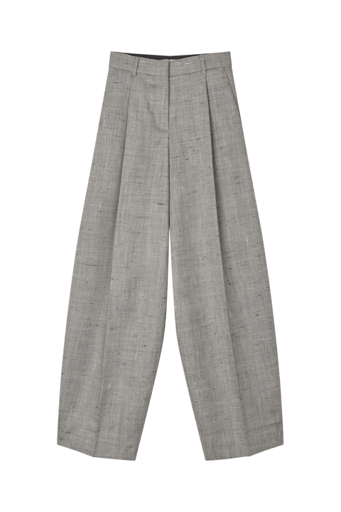 Light sage green wide-leg pants with a textured vertical stripe pattern, featuring an elastic waistband with cream drawstrings and tassels.