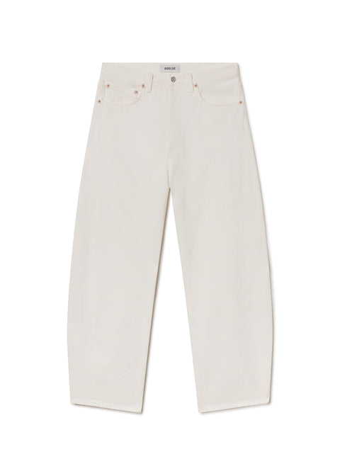 Flat lay of Person wearing white mid-rise jeans on a white background 