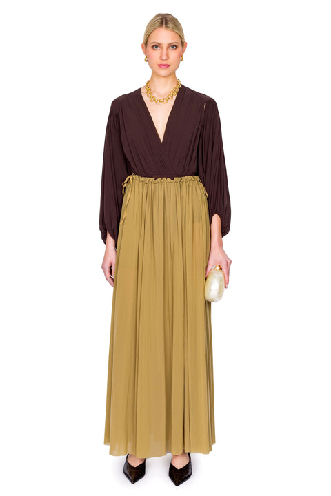 Model wearing brown v-neck long sleeve bodysuit and tulle skirt.