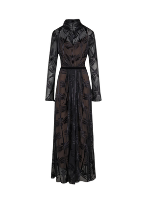 A long-sleeved black sheer mesh maxi dress with a dark brown underlayer and a tonal leaf pattern, featuring a high collar and a self-tie waist belt.
