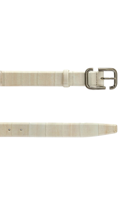 Up close shot of beige leather belt with metal buckle on a white background