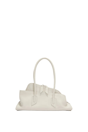 White leather handbag on a wg grey backgroundhite
