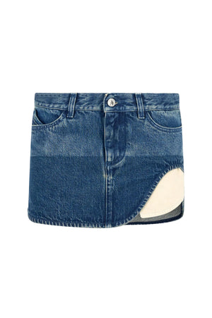 Blue two-toned denim skirt with an architectural cutout on a white background