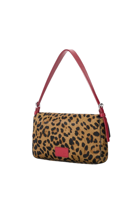 A leopard print shoulder bag with a red leather strap and trim, shown against a plain white background.