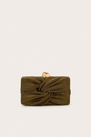 Dark green clutch that features a knotted straw detail and abstract gold hardware. 