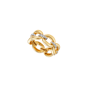 Yellow gold and diamond loop ring on a solid background