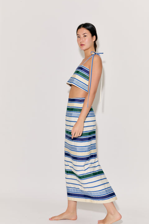 Model wears ribbon striped pencil skirt with matching crop top.