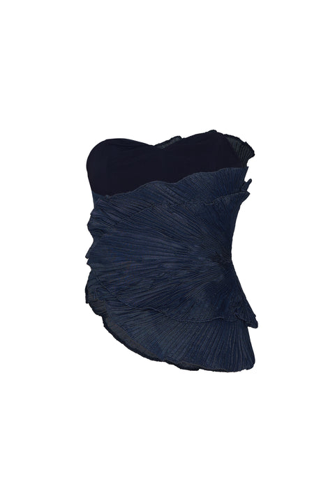 Flat lay of back of navy blue wide-leg pants on a white background
