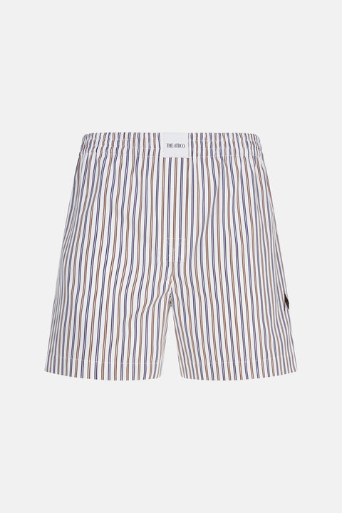 Ghost image of a pair of navy and brown pinstripe boxer shorts that feature a small logo embroidered on the side and an elastic waistband with a white logo patch on the front. 