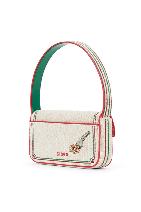 View of the back of a glass beaded shoulder bag that features an icon of spaghetti wrapped around a fork and a green and red border. 