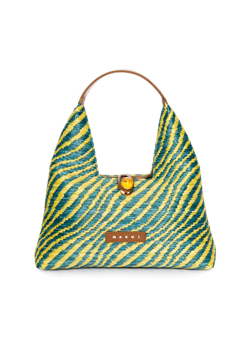 Handbag with green and yellow zebra pattern on a white background