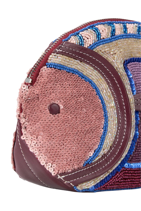 Close-up of a colorful beaded fish clutch with pink sequins on a white background